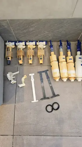 מגוון מנגנוני מילוי, אטמים וגומיות פעמון לניאגרות סמויות